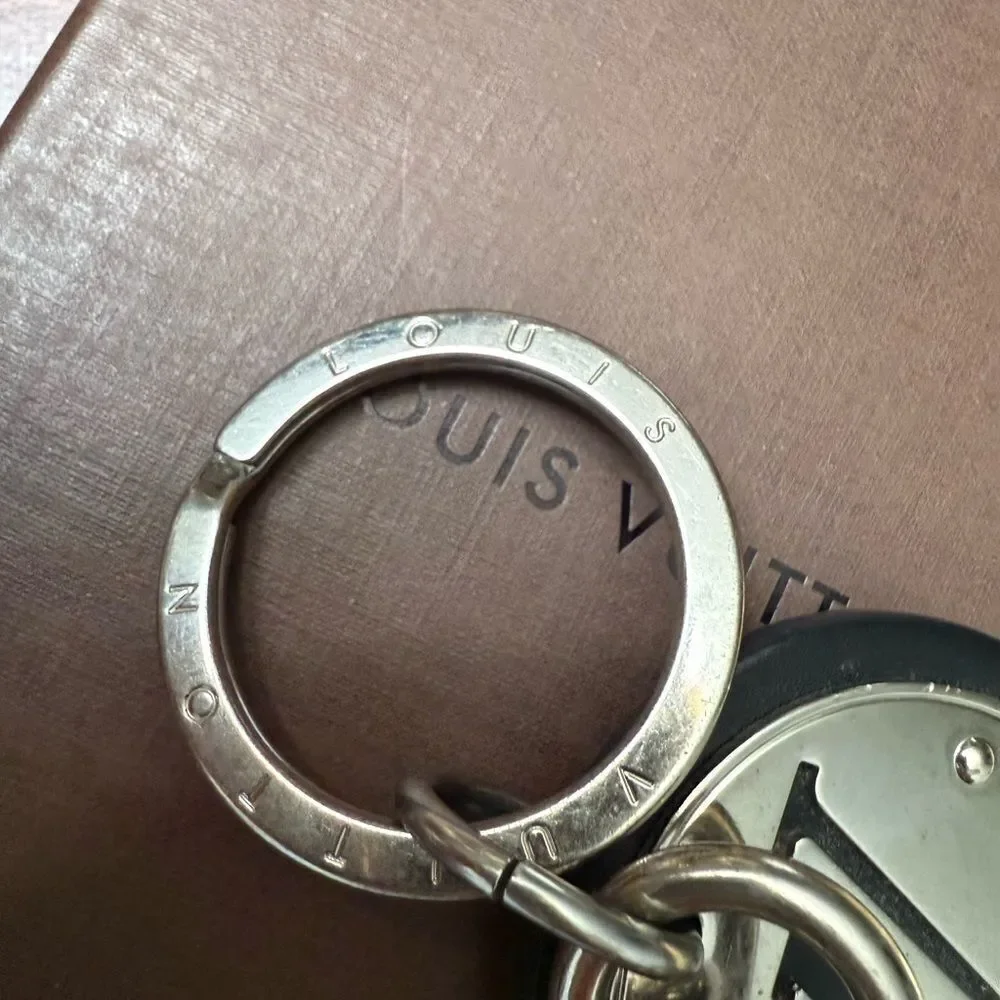 Used in great condition Louis Vuitton Silver and Black Keychain minor scratches - Picture 8 of 10